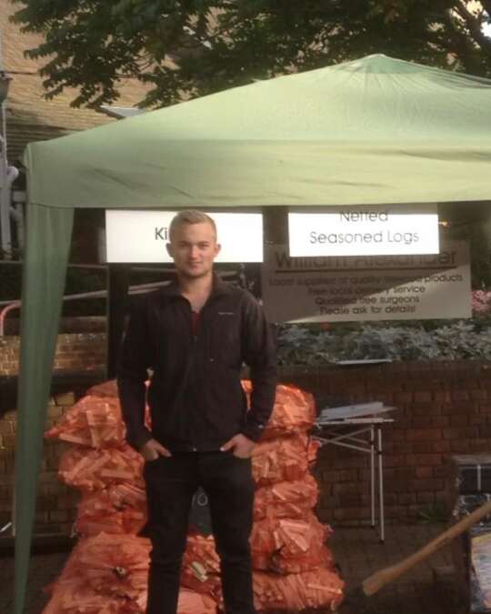 Alex on the very first day at the market stall